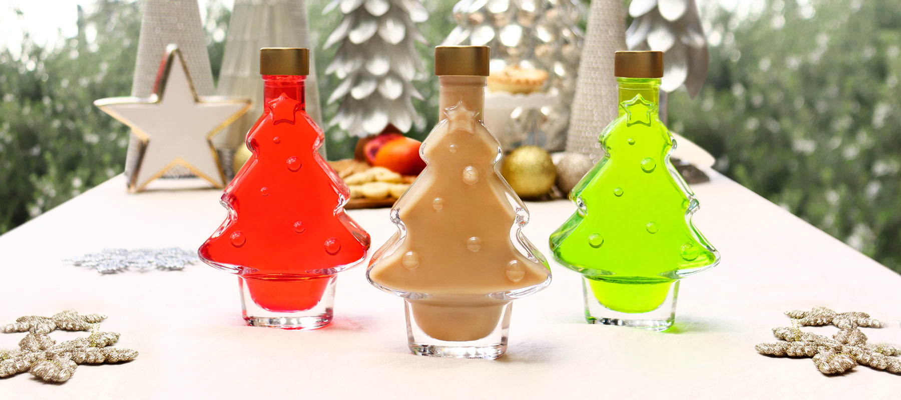 Unwrap the Magic: Flaschengeist's Christmas Tree Bottle Filled with Amazing Strawberry Liqueur