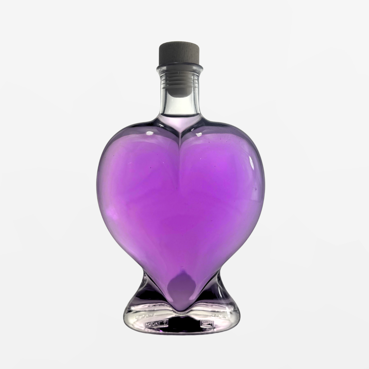 Flaschengeist Heart Birthday Gift — romantic handcrafted glass heart bottle filled with premium spirits, front-facing hero shot on cream background