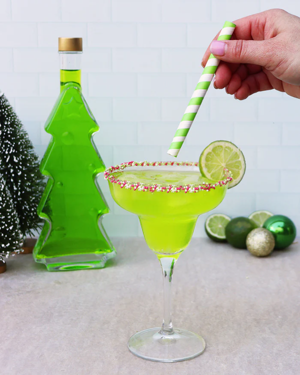 Unwrap the Magic: Flaschengeist's Christmas Tree Bottle Filled with Zesty Lemon Lime Liqueur